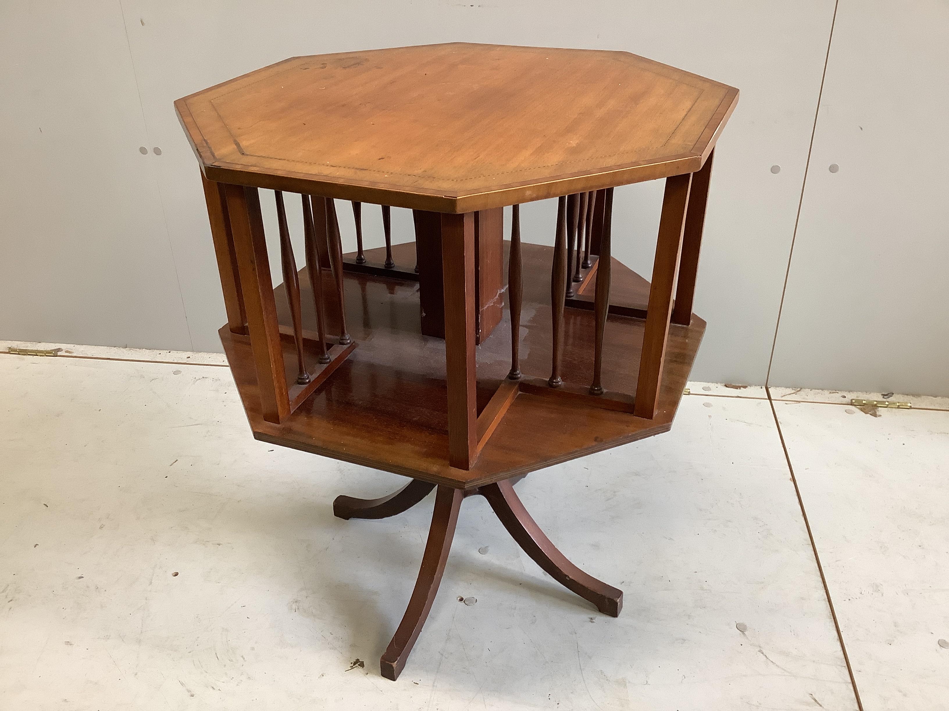 An Edwardian satinwood banded octagonal mahogany revolving bookcase, width 59cm, height 71cm